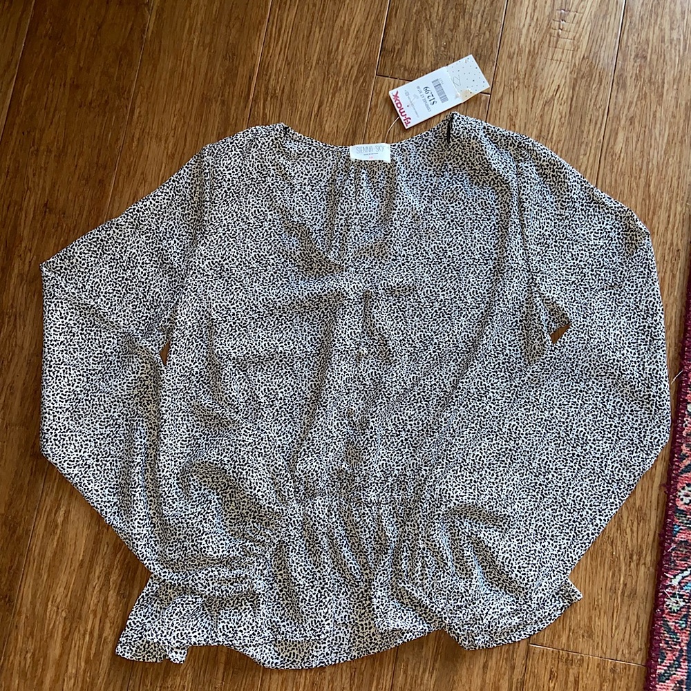 Sienna Sky Animal Print Peplum top